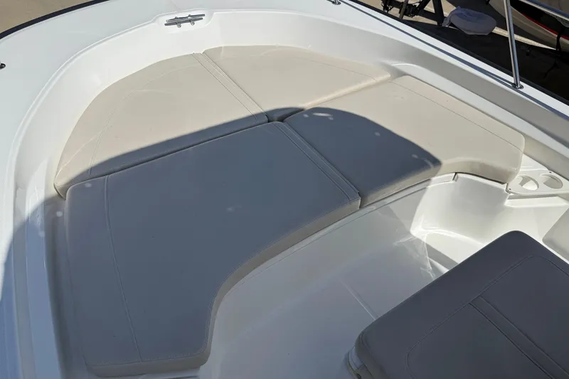 Slide: The Image of 2019 Boston Whaler 190 Montauk boat seat, beige upholstery, stainless steel frame. - 30
