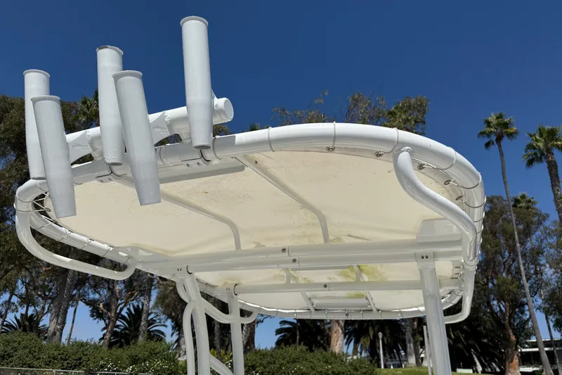 Slide: The Image of 2019 Boston Whaler 190 Montauk boat with Mercury outboard motor on trailer. - 9