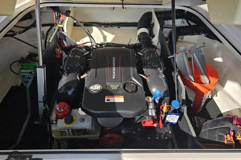 Slide: The Image of 2018 Regal 2500 Bowrider engine compartment with Volvo Penta 350 V8 engine. - 105