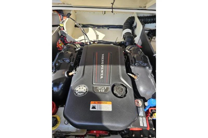 Slide: The Image of Volvo Penta 350 V6 engine in 2018 Regal 2500 Bowrider boat. - 107