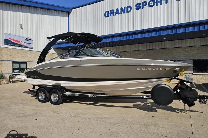 Slide: The Image of 2018 Regal 2500 Bowrider boat on trailer outside Grand Sport Center. - 14