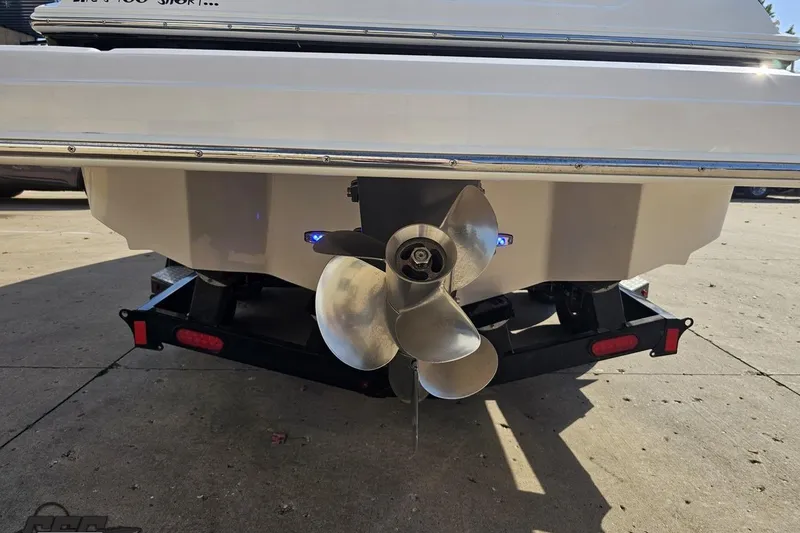 Slide: The Image of 2018 Regal 2500 Bowrider boat stern with propeller on trailer. - 30