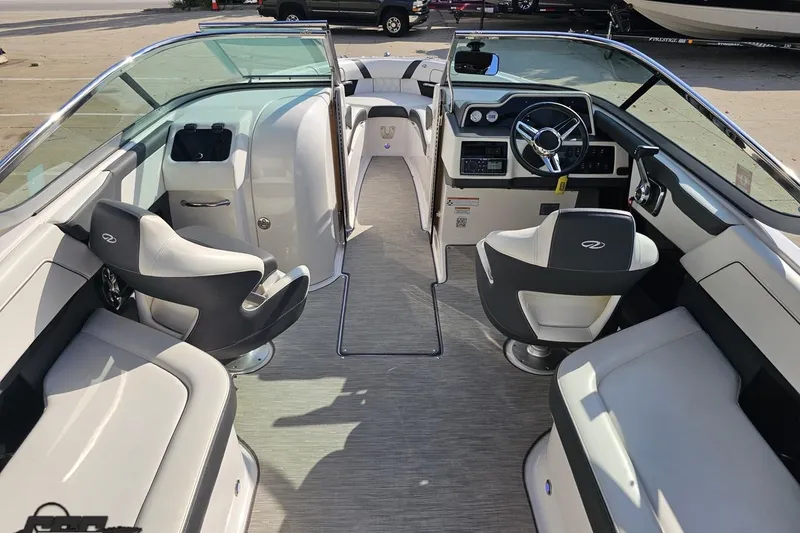 Slide: The Image of 2018 Regal 2500 Bowrider interior with modern seating and sleek dashboard design. - 48