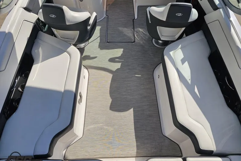 Slide: The Image of 2018 Regal 2500 Bowrider interior with white seating and modern design. - 49