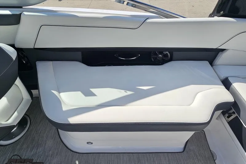 Slide: The Image of 2018 Regal 2500 Bowrider interior seating with white upholstery and sleek design. - 54