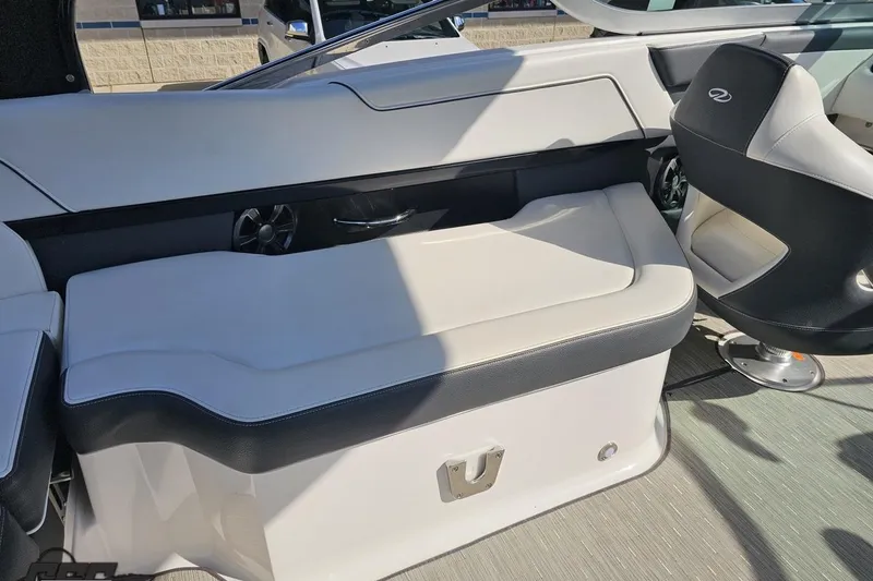 Slide: The Image of 2018 Regal 2500 Bowrider interior with white seating and black accents. - 58