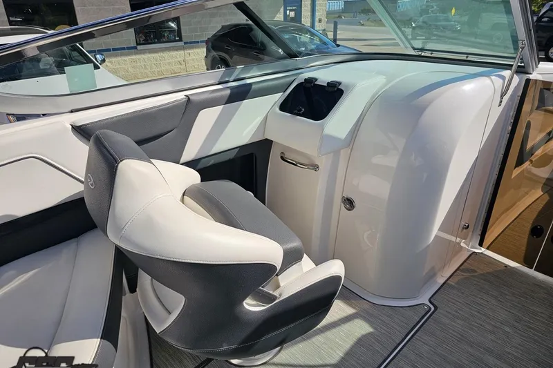 Slide: The Image of 2018 Regal 2500 Bowrider interior with sleek seating and modern dashboard design. - 61