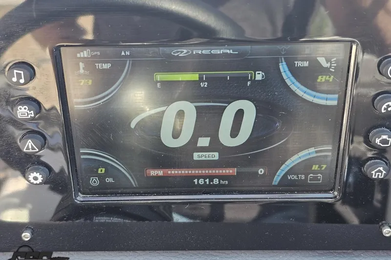Slide: The Image of Dashboard of a 2018 Regal 2500 Bowrider boat showing speed, RPM, and fuel levels. - 73