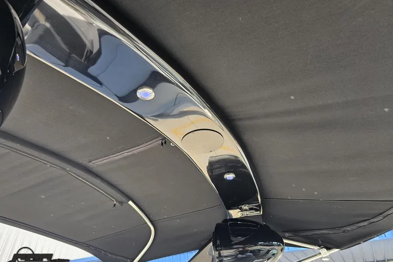 Slide: The Image of 2018 Regal 2500 Bowrider boat canopy with sleek black finish and integrated lighting. - 74