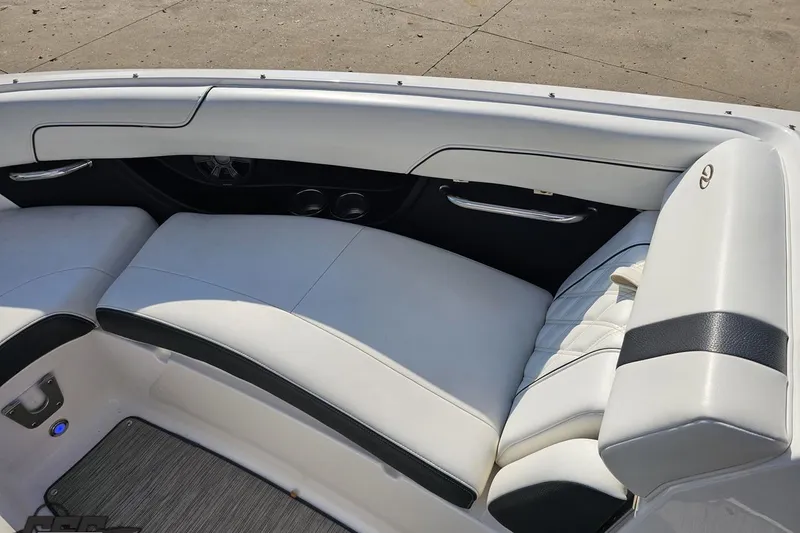 Slide: The Image of 2018 Regal 2500 Bowrider interior with white leather seating and sleek design. - 79