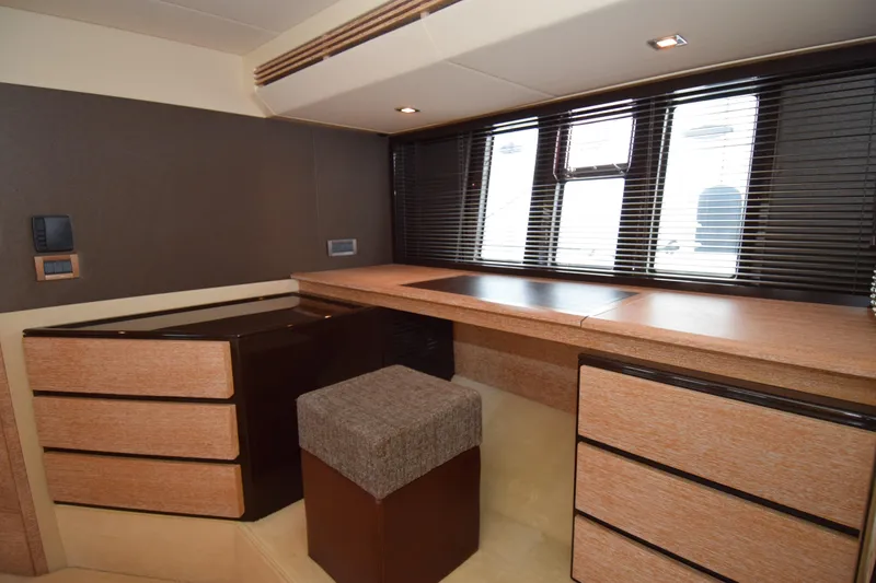 Slide: The Image of Luxurious interior of 2010 Azimut 58 yacht with modern cabinetry and seating. - 15