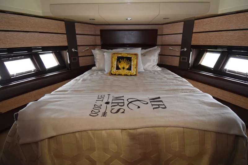 Slide: The Image of Luxurious bedroom interior of 2010 Azimut 58 yacht with elegant bedding and decor. - 16