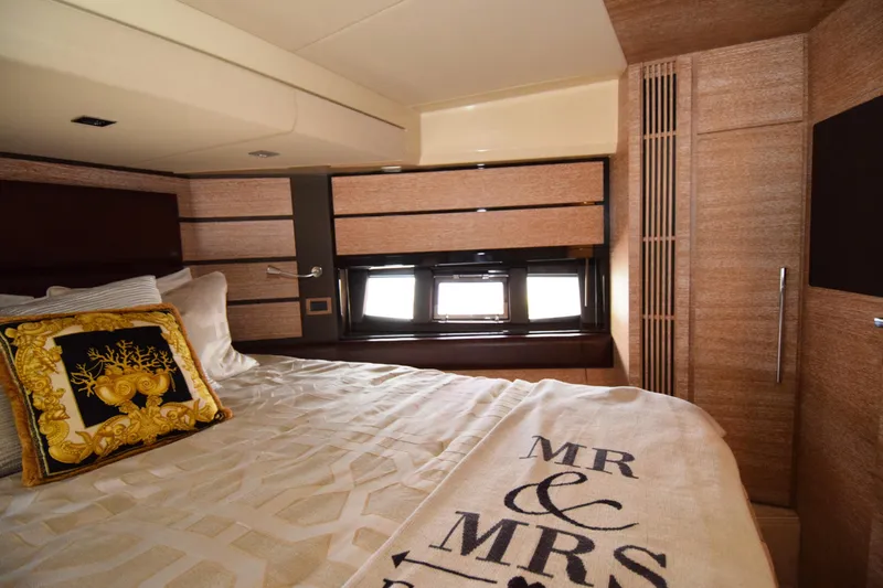 Slide: The Image of Luxurious bedroom interior of 2010 Azimut 58 yacht with elegant decor and cozy bedding. - 18