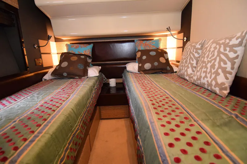 Slide: The Image of Twin cabin interior of 2010 Azimut 58 yacht with colorful bedding and pillows. - 20