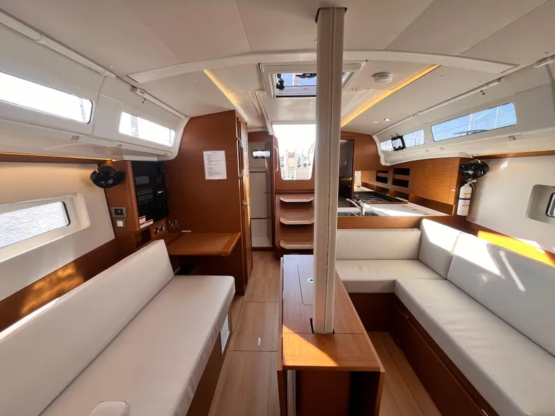 Slide: The Image of Interior of 2024 Jeanneau 380 yacht, featuring modern design and spacious seating area. - 16