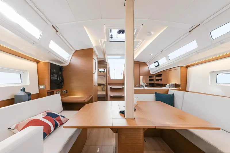 Slide: The Image of Interior of 2024 Jeanneau 380 sailboat, featuring modern design and spacious seating area. - 18