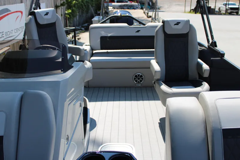 Slide: The Image of Interior of 2026 Starcraft SLS 3 Q DH boat with modern seating and sleek design. - 14