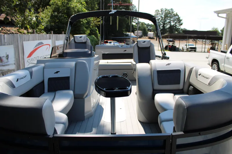 Slide: The Image of 2026 Starcraft SLS 3 Q DH pontoon boat with luxurious seating and modern design. - 6