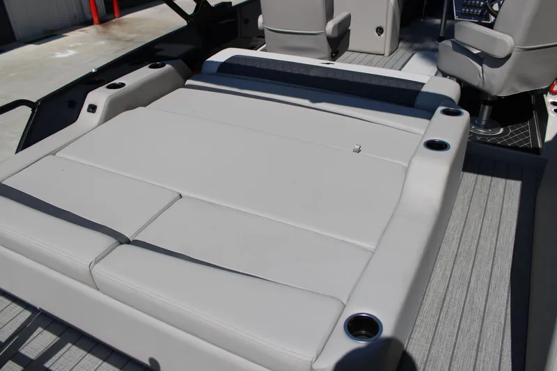 Slide: The Image of 2026 Starcraft SLS 3 Q DH boat interior with spacious seating and cup holders. - 8