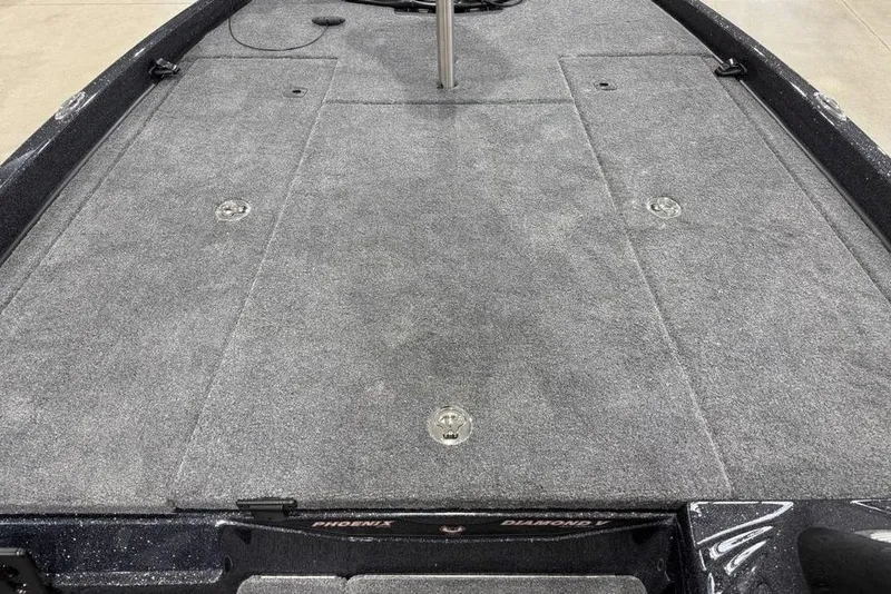 Slide: The Image of 2026 Phoenix 721 ZXL boat deck with gray carpet and storage compartments. - 14