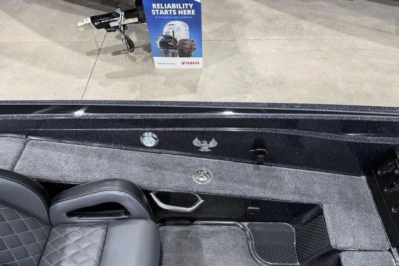Slide: The Image of Interior of 2026 Phoenix 721 ZXL boat with Yamaha reliability sign in background. - 16