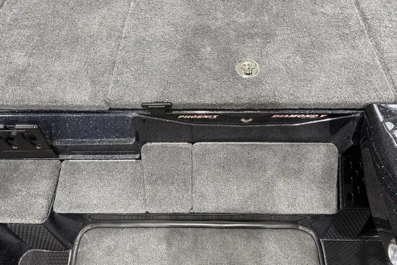 Slide: The Image of 2026 Phoenix 721 ZXL boat interior with gray carpet and storage compartments. - 18