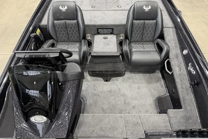 Slide: The Image of 2026 Phoenix 721 ZXL boat interior with dual black leather seats and modern dashboard. - 20