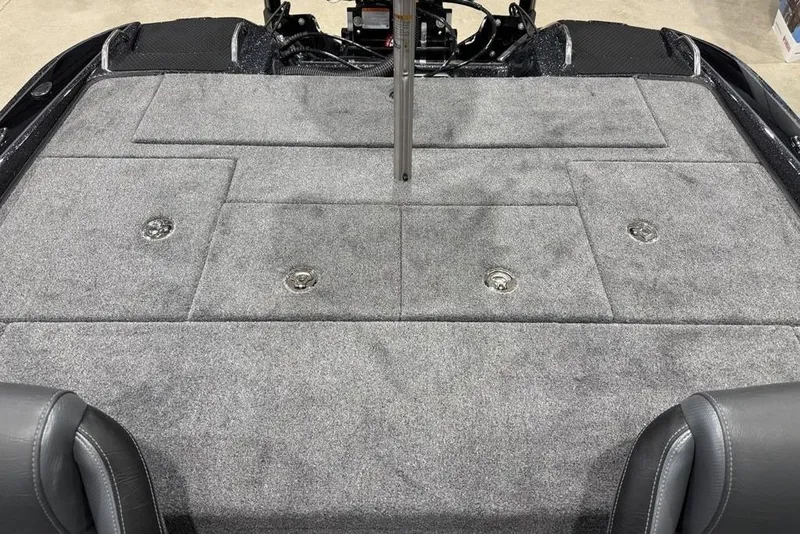 Slide: The Image of 2026 Phoenix 721 ZXL boat deck with gray carpet and storage compartments. - 31