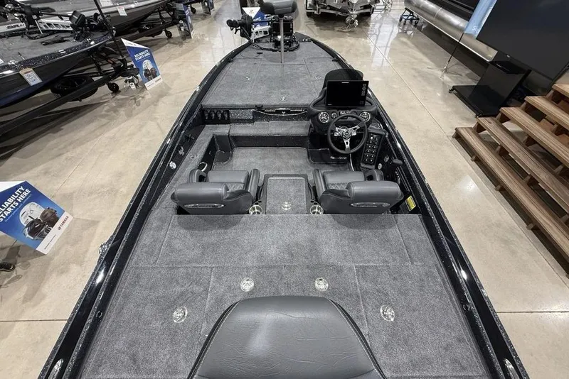 Slide: The Image of 2026 Phoenix 721 ZXL boat interior with gray seating and modern dashboard. - 35