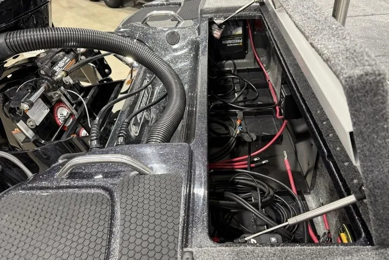 Slide: The Image of 2026 Phoenix 721 ZXL boat interior showing engine and wiring details. - 36