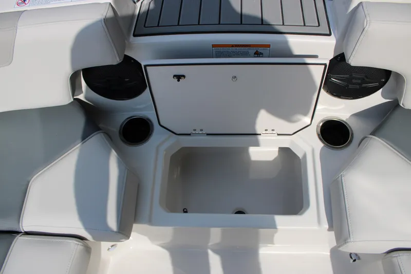 Slide: The Image of Interior of 2026 Starcraft SVX 190 OB boat with seating and storage compartments. - 16