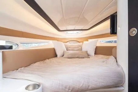 Slide: The Image of Luxurious interior of 2026 Hanover 305 White and Black Premium Edition yacht cabin. - 10
