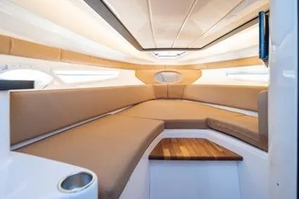 Slide: The Image of Luxurious interior of 2026 Hanover 305 White and Black Premium Edition boat. - 12