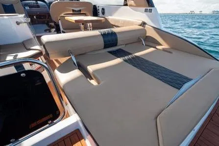Slide: The Image of Luxurious Hanover 305 boat interior, 2026 model, featuring premium seating and ocean view. - 9