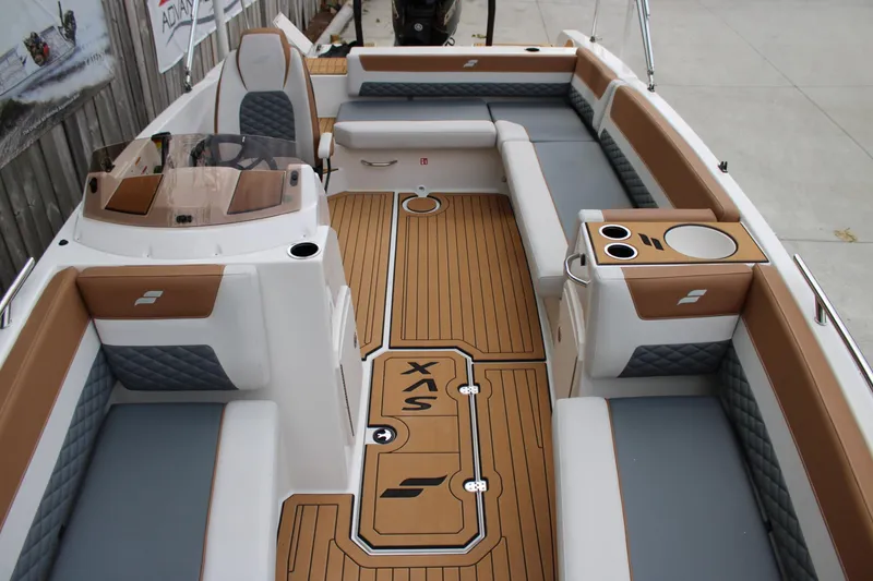 Slide: The Image of 2025 Starcraft SVX 211 OB boat interior with stylish seating and modern design. - 21