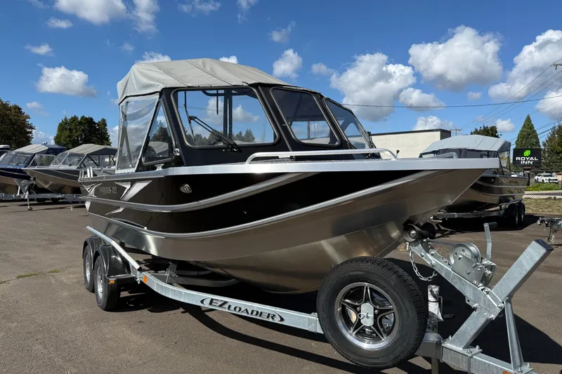 The Image of 2025 Thunder Jet 200 Luxor boat on trailer under blue sky. - 0