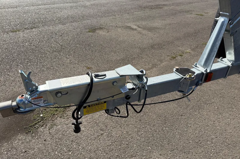 Slide: The Image of Trailer hitch of 2025 Thunder Jet 200 Luxor on asphalt surface. - 10