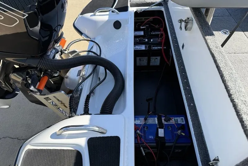 Slide: The Image of 2019 Phoenix 618 Pro boat showing engine and battery compartment details. - 17