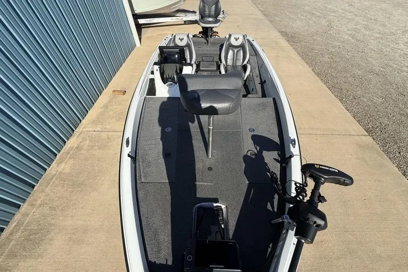 Slide: The Image of 2019 Phoenix 618 Pro fishing boat with seating and trolling motor. - 24