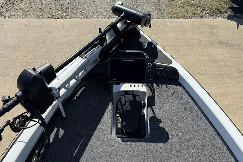 Slide: The Image of 2019 Phoenix 618 Pro boat dashboard with advanced navigation equipment. - 7