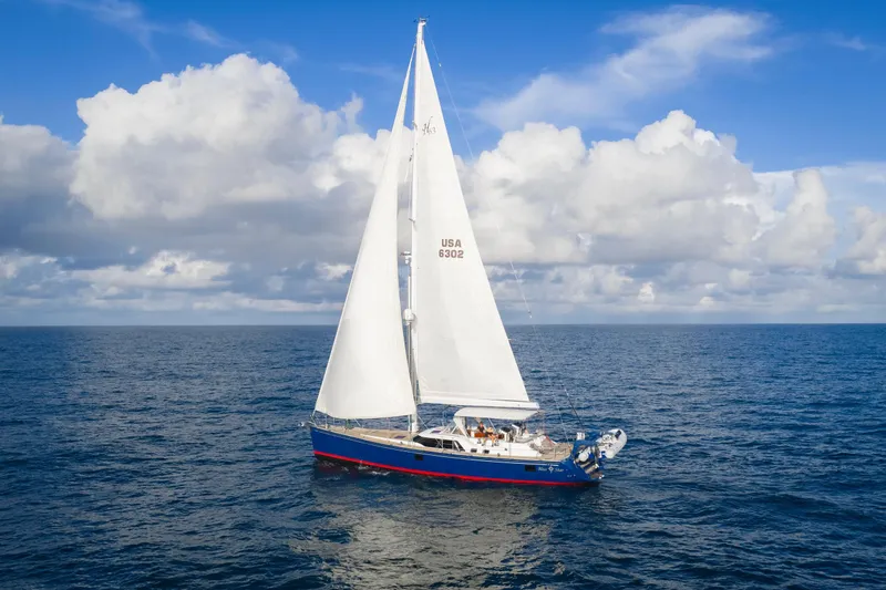 Slide: The Image of Sailing yacht Hylas 63, 2013 model, cruising on open ocean under blue sky. - 16