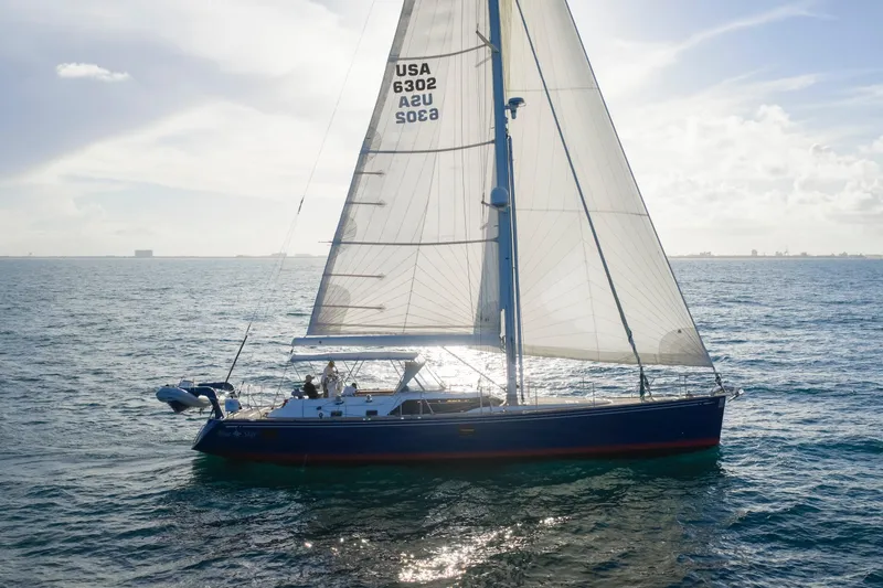 Slide: The Image of Sailing yacht Hylas 63, 2013 model, gliding on open sea under clear skies. - 19