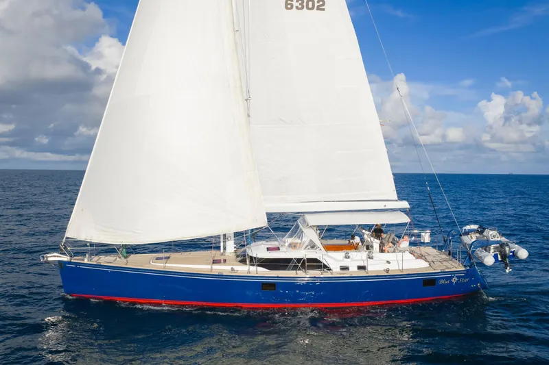 Slide: The Image of Sailing yacht Hylas 63, 2013 model, cruising on open sea under clear skies. - 21