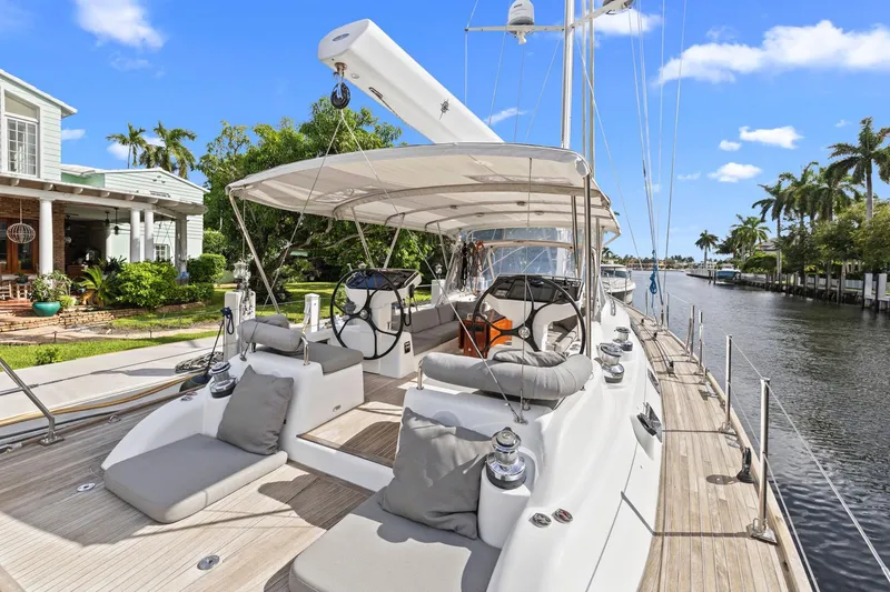 Slide: The Image of Luxurious 2013 Hylas 63 yacht docked by a scenic waterfront home. - 22
