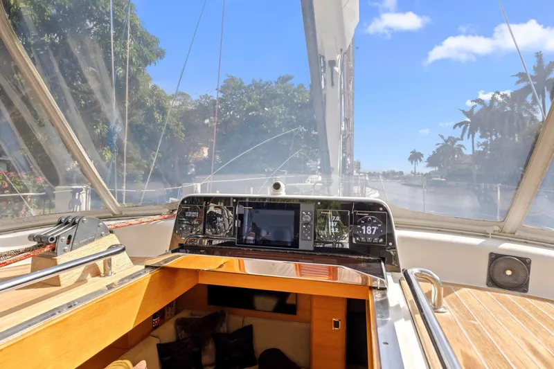 Slide: The Image of Cockpit view of 2013 Hylas 63 yacht with navigation instruments and clear skies. - 30