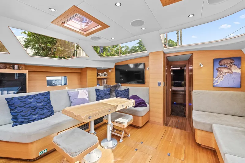 Slide: The Image of Luxurious interior of a 2013 Hylas 63 yacht with modern seating and skylights. - 39