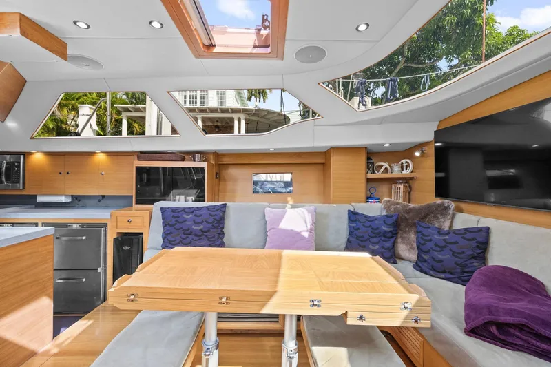 Slide: The Image of Luxurious interior of 2013 Hylas 63 yacht with modern design and comfortable seating. - 43