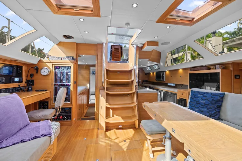 Slide: The Image of Luxurious interior of a 2013 Hylas 63 yacht with modern amenities and wooden finishes. - 44