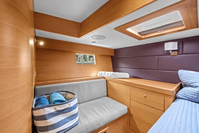 Slide: The Image of Luxurious cabin interior of 2013 Hylas 63 yacht with modern wood finish. - 52