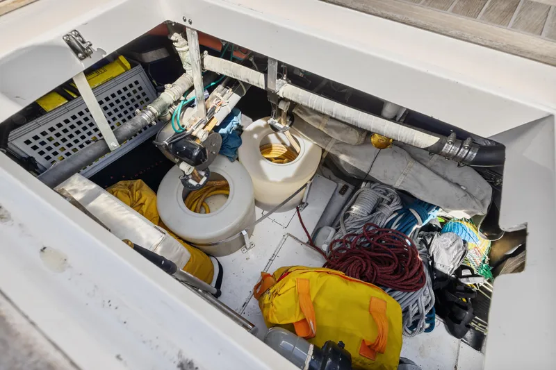 Slide: The Image of Storage compartment on a 2013 Hylas 63 yacht with ropes and equipment. - 75